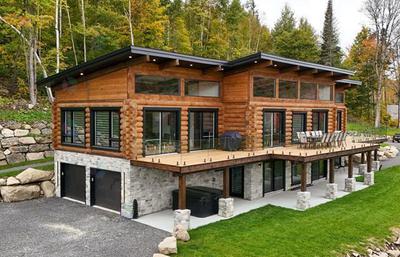 Modern log home on lot 60 at the Royal Laurentien Golf Club, Mont-Blanc, Québec